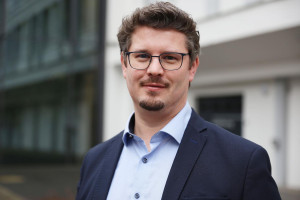 Portrait von Dr. Tim Fechtner.