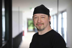 Portrait von Dr. Raffael Kettler.