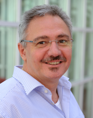 Portrait von Prof. Mag. Dr. Christian Huber.